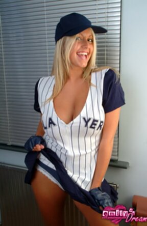 Blonde Emily strips baseball uniform and poses with bat